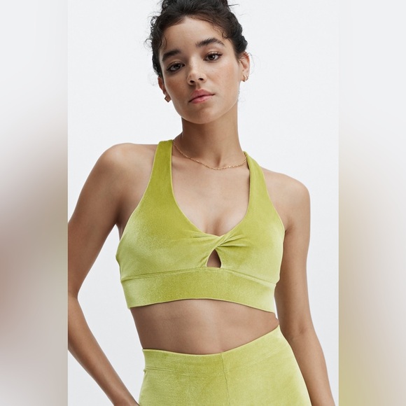 Fabletics Oasis Twist Velour Sports Bra In Green Leaf - Picture 2 of 7